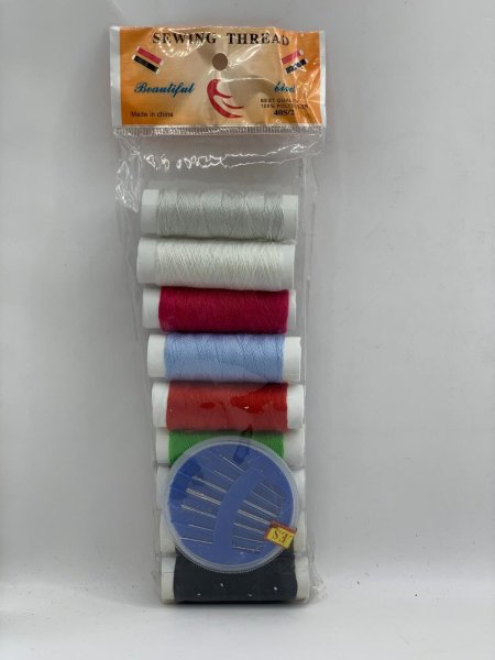 لفات خياطة مع دبابيس